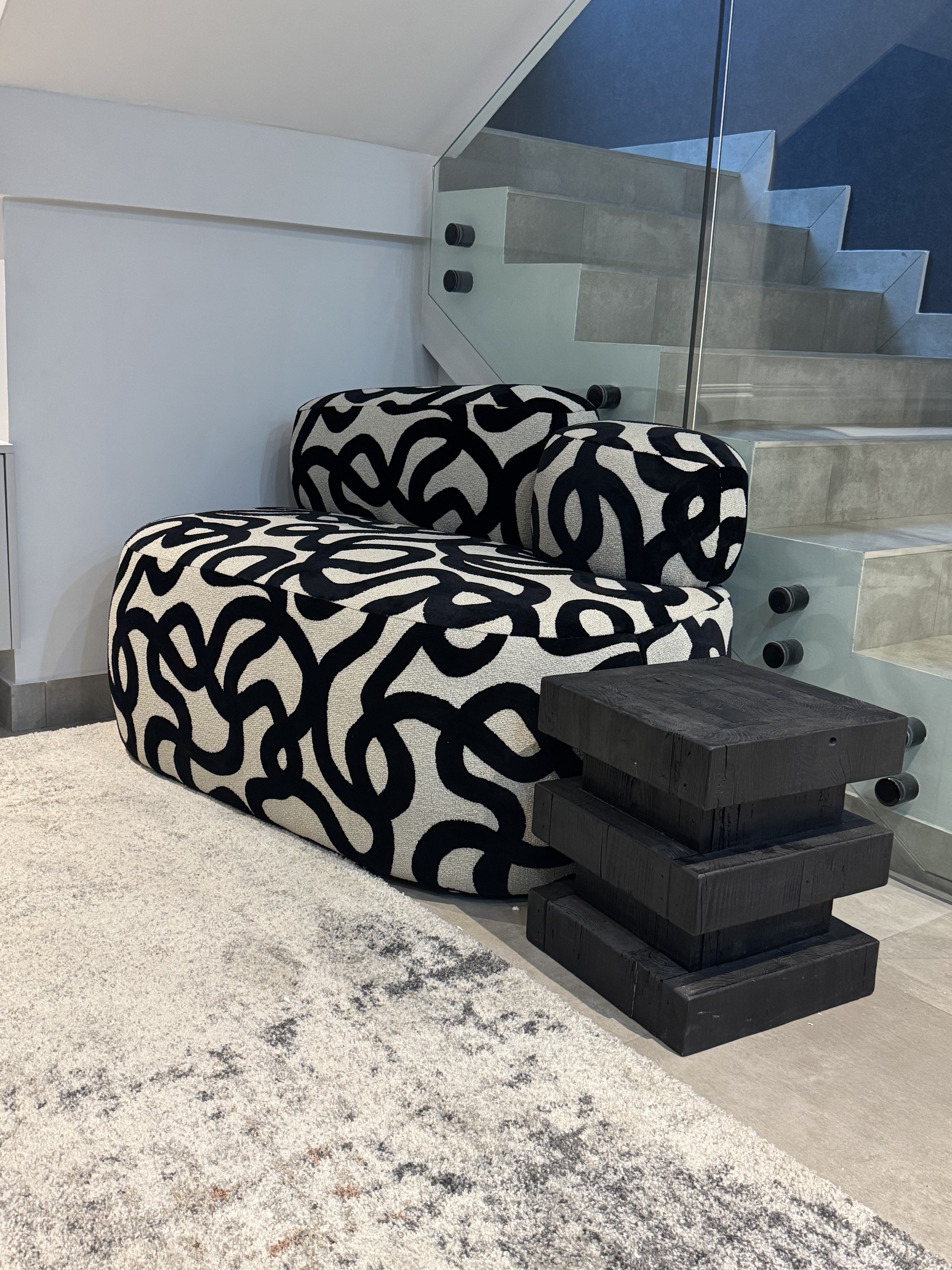 Custom marble-top coffee table with seating